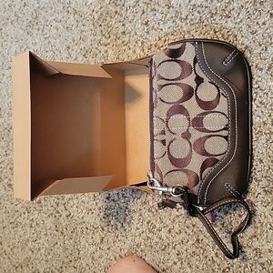 Used Coach wristlet